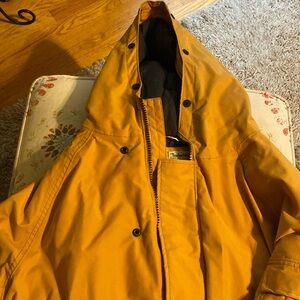 Men’s Waterproof Winter Jacket with hood drawstring bottom zipper pockets